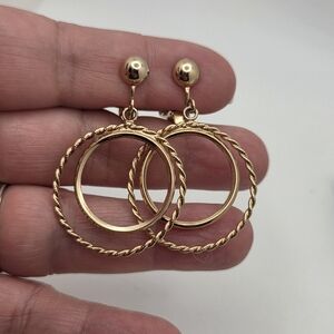 Avon Gold Tone Twisted Hoop Earrings Clip On